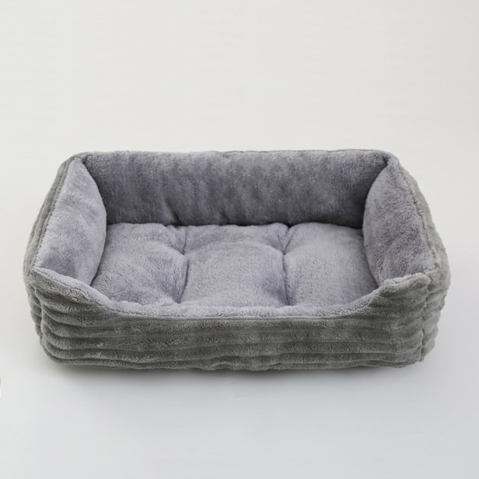 Dog Bed: Cozy up your furry friend with our Plush Kennel and Sofa Bed Cushion!